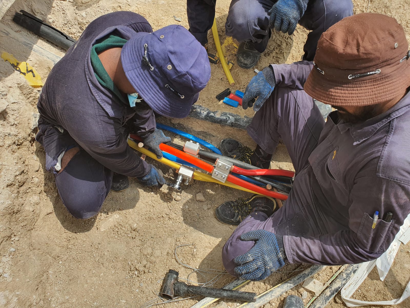 Pegasus crew performing underground cable jointing at a construction site